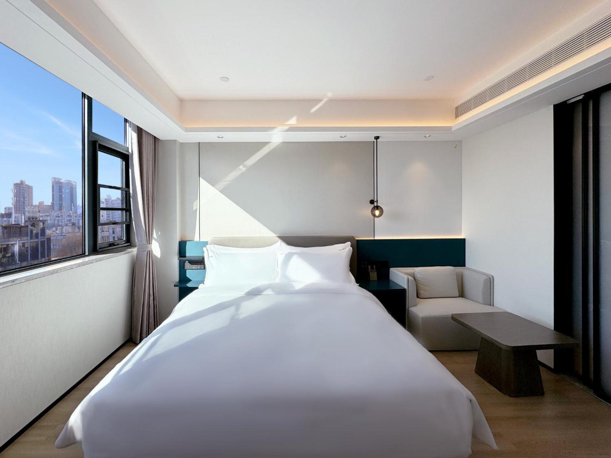 Holiday Inn Zhengzhou Zhongzhou By Ihg מראה חיצוני תמונה